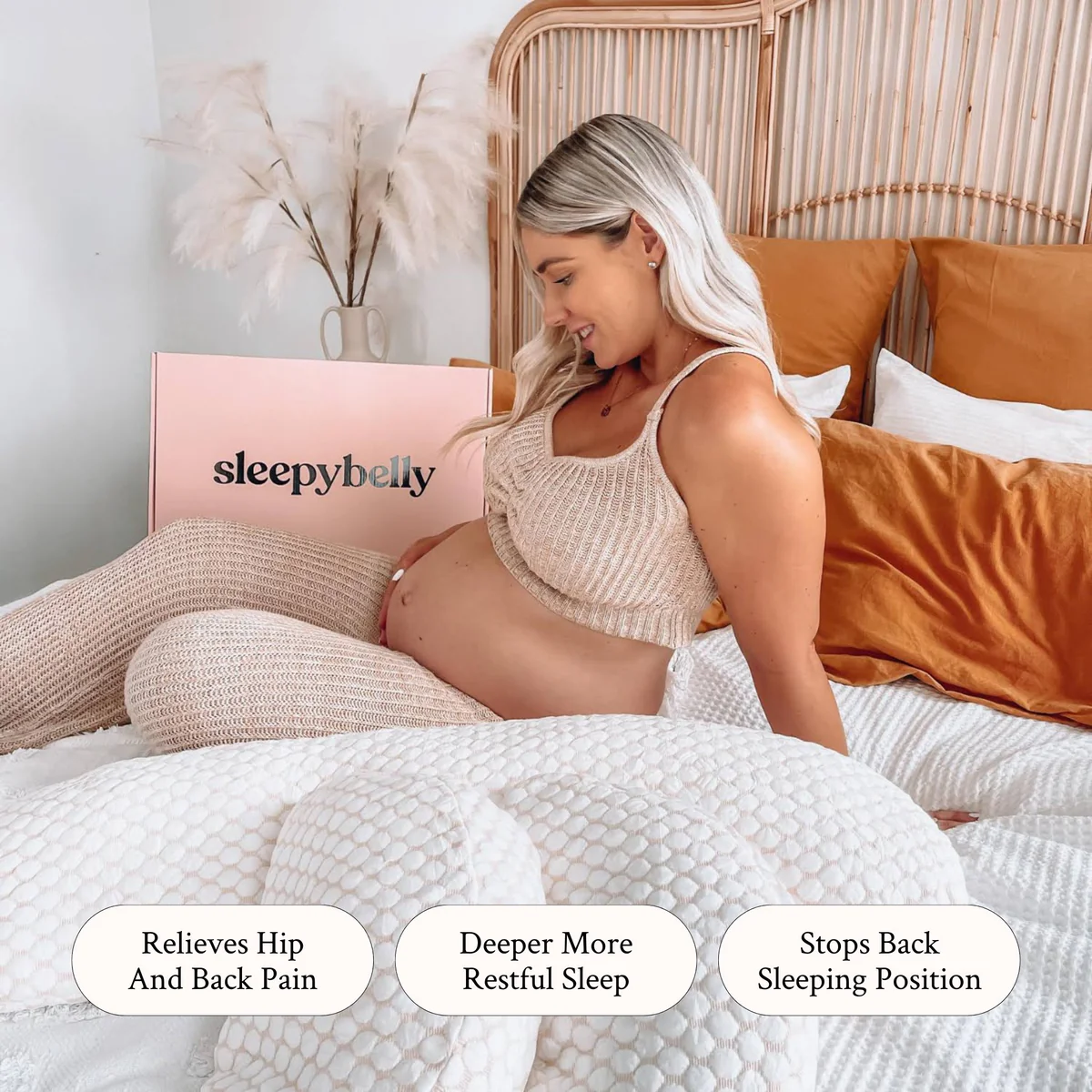 pregnant blonde female with new sleepybelly pregnancy pillot