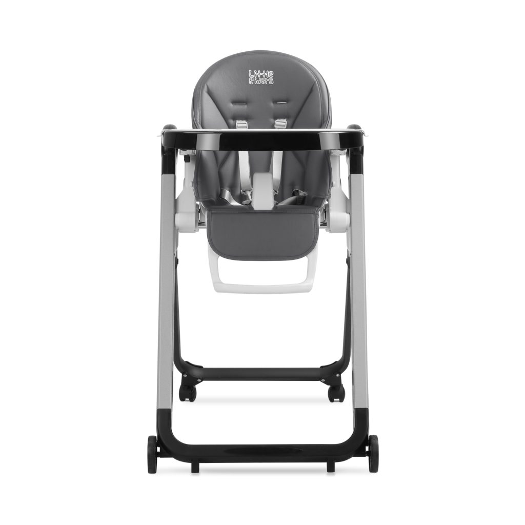 A modern Little Riders high chair, featuring a gray padded seat, white plastic frame, and black metal legs. Viewed from the front, it includes a safety harness and rear wheels for easy mobility—perfect for any high chair review.